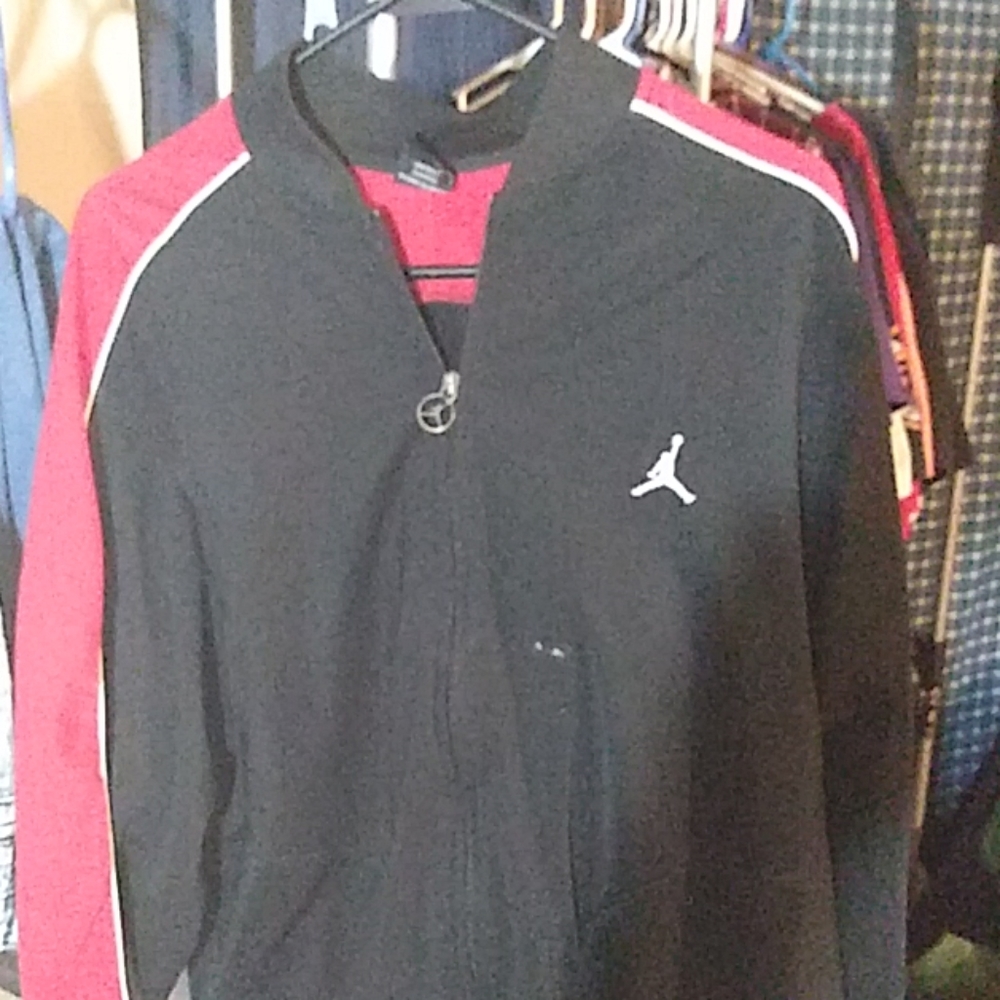 A zip up jacket and some son of mars to match